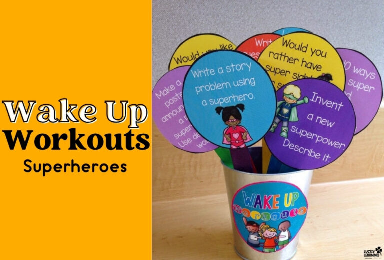 A metal cup holds colorful superhero-themed activity sticks with writing prompts for children; text reads "Wake Up Workouts Superheroes.