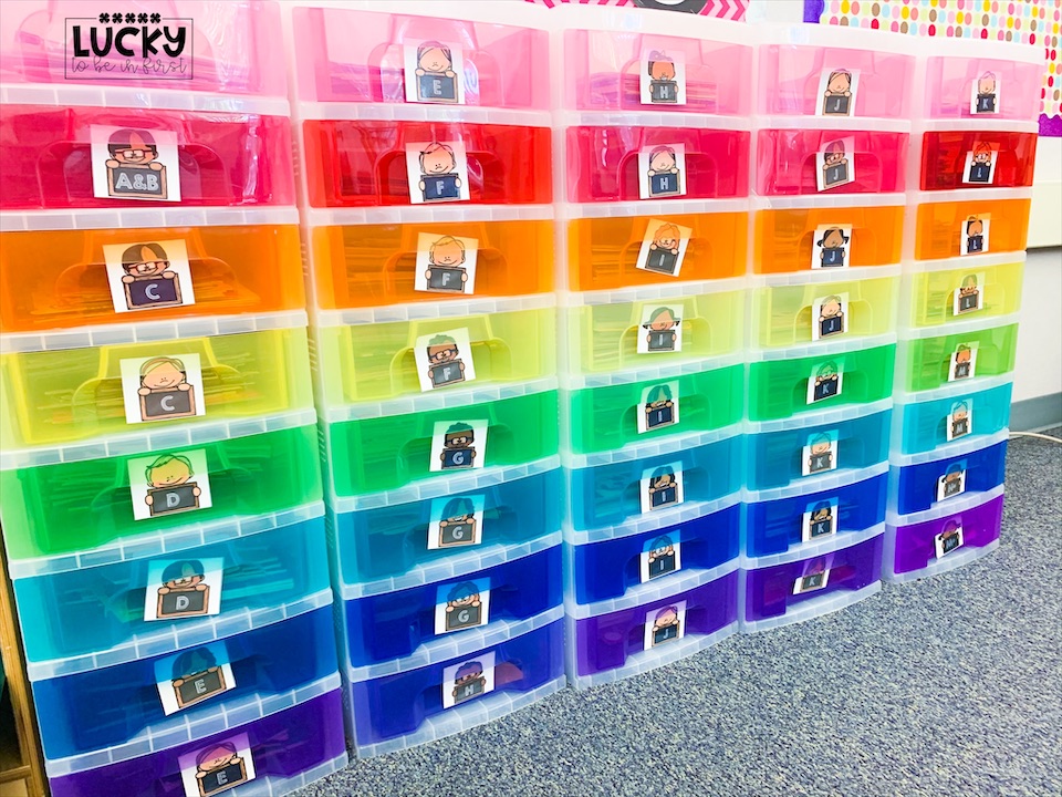 Let students shop for book. Colorful bins are inviting for students to select books.