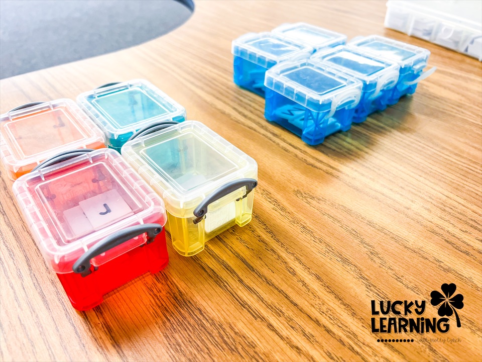 tiles set up for a phonics activity with decodable texts | Lucky Learning with Molly Lynch 