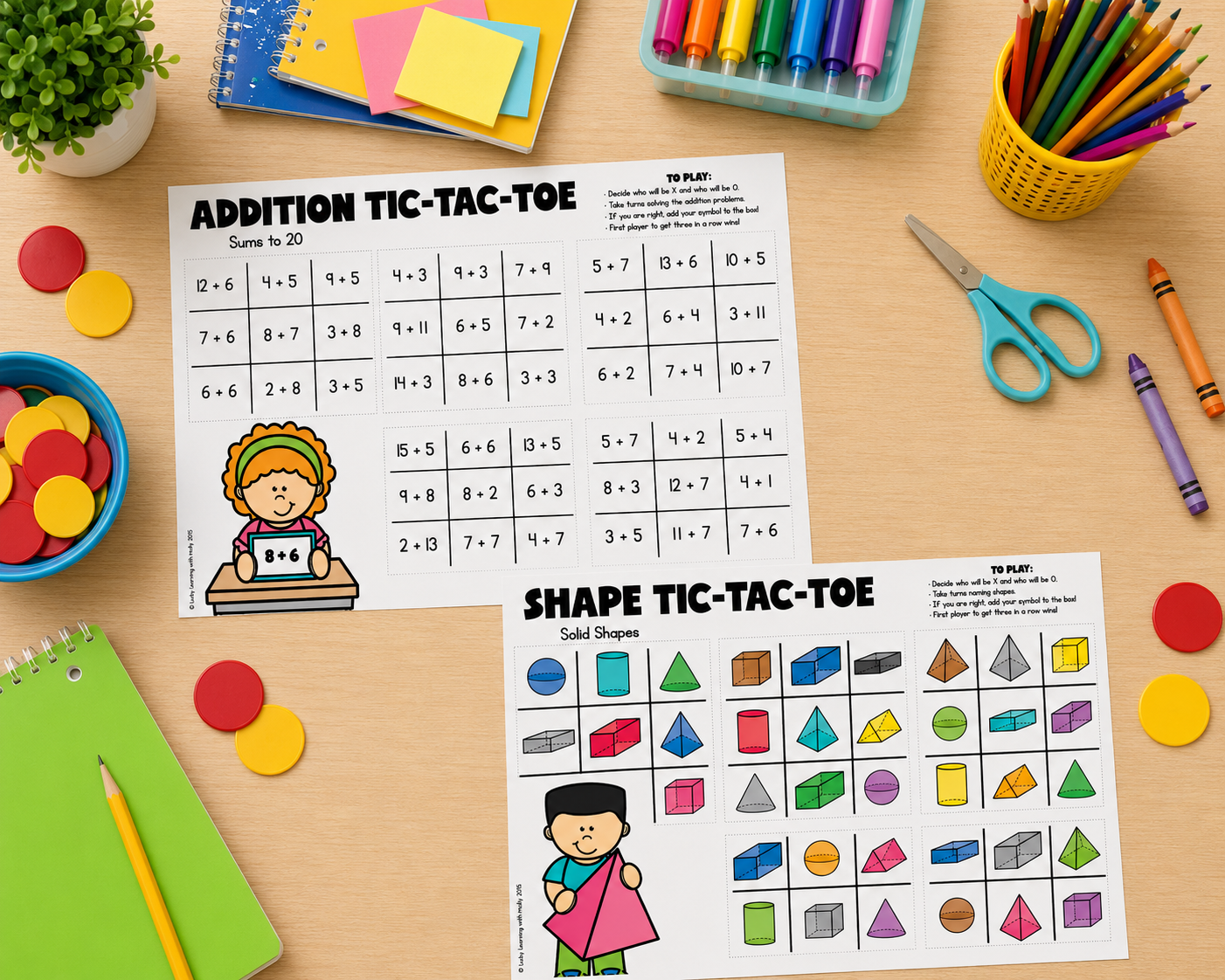Two tic-tac-toe math fact fluency games—one for addition and one for shapes—are on a desk among school supplies like colored pencils, scissors, and notebooks.