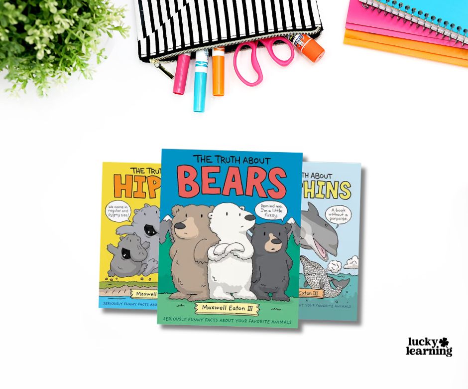 Three illustrated children’s books about animals, arranged on a white surface with stationery items and a plant nearby. This charming book series features "The Truth About Bears" as the central title.